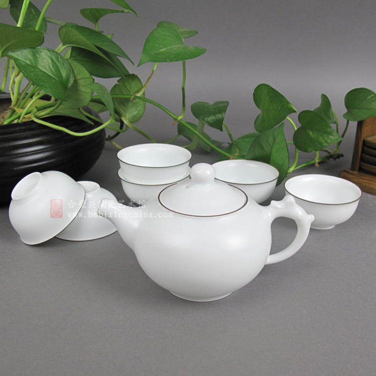 《7头紫金口茶具》